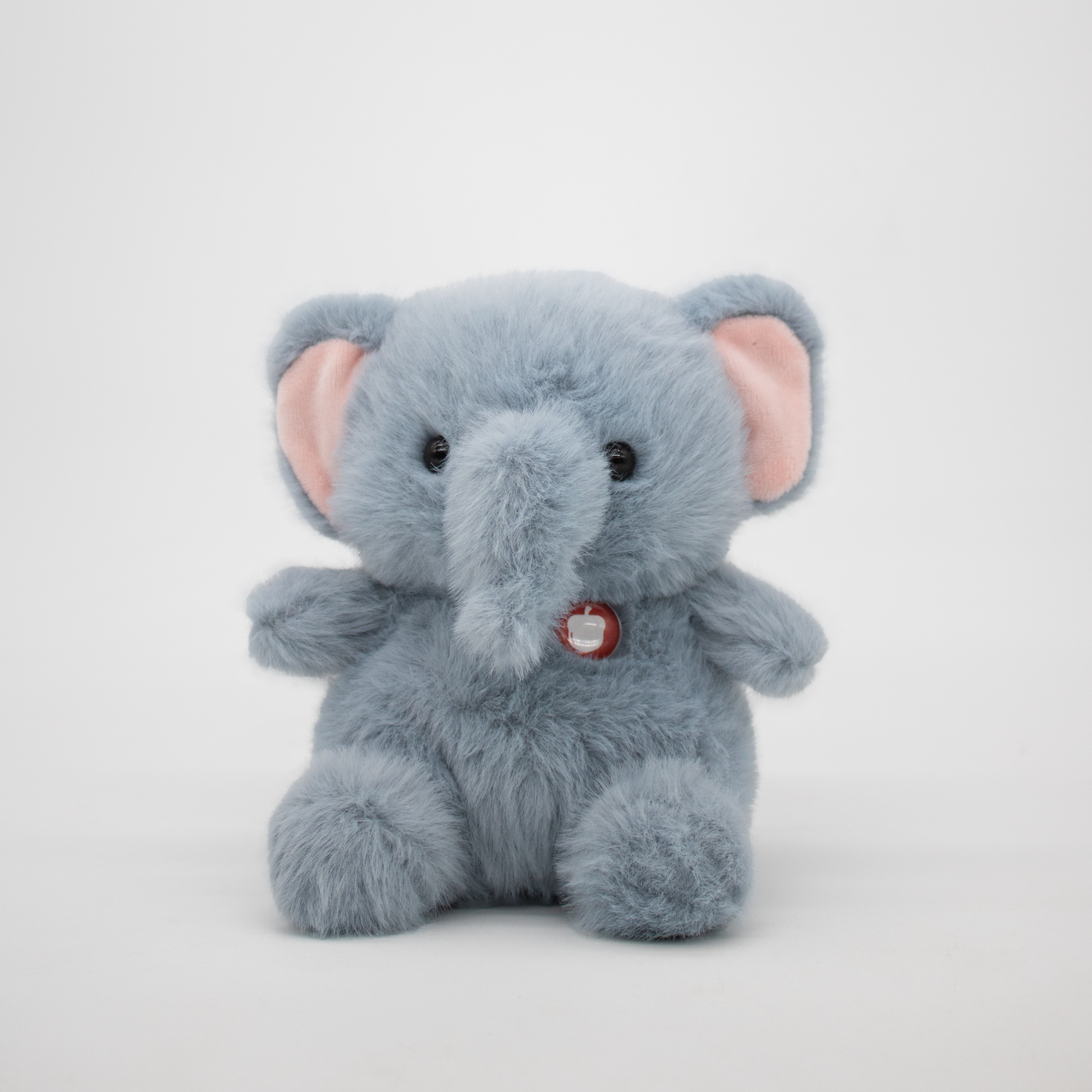 Plush elephant on a white background