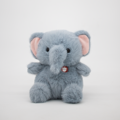 Plush elephant on a white background