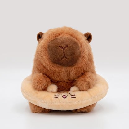 Cute Capybara plush wearing a cat floatie 