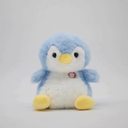 Plush penguin with blue body and yellow feet on a light gray background waving hello.
