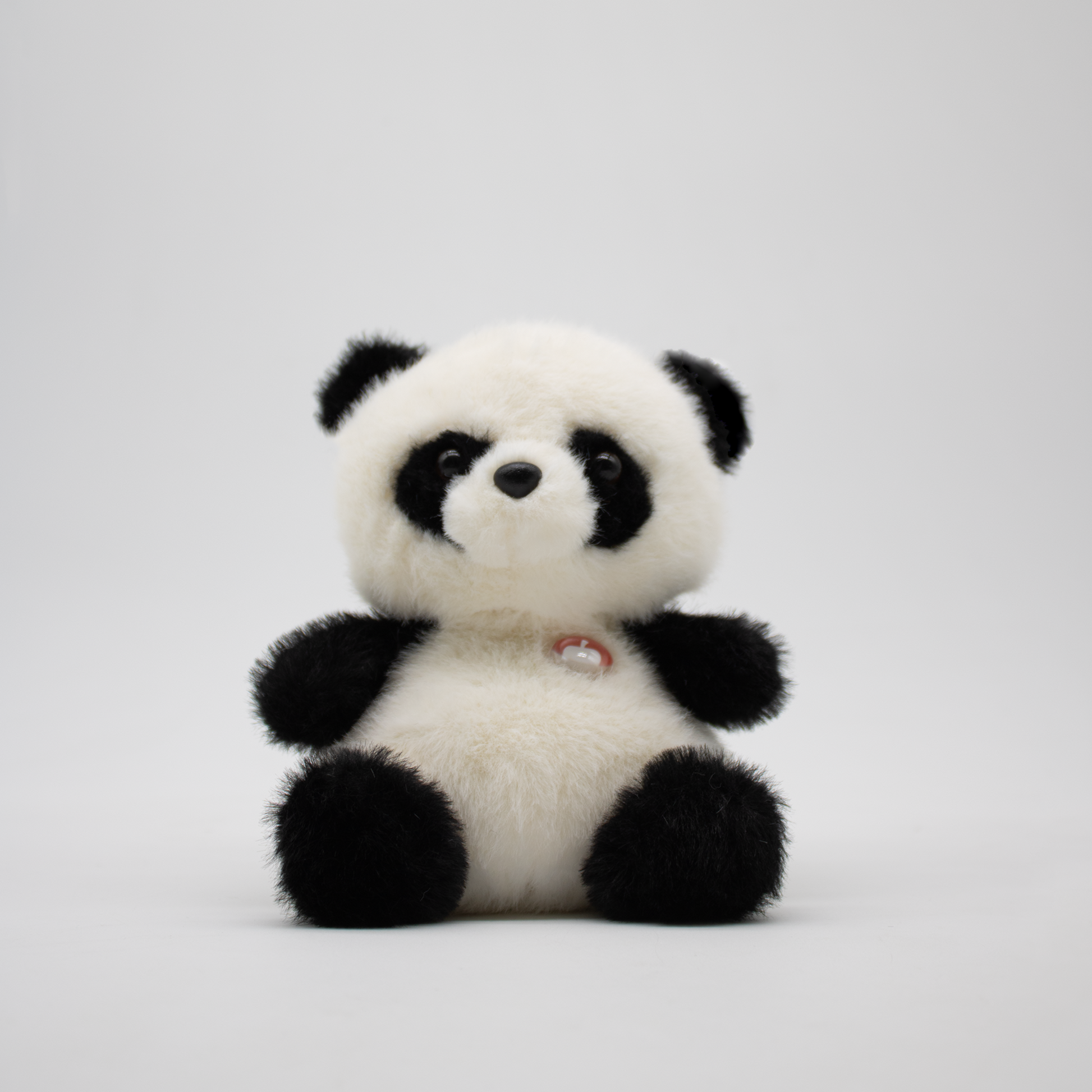 Plush panda on a white background