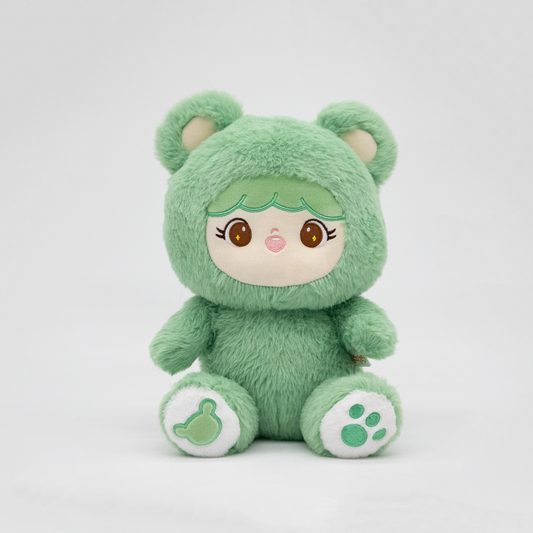 Green Sprout Shoobi plush bear with ears, white and cream details on white background