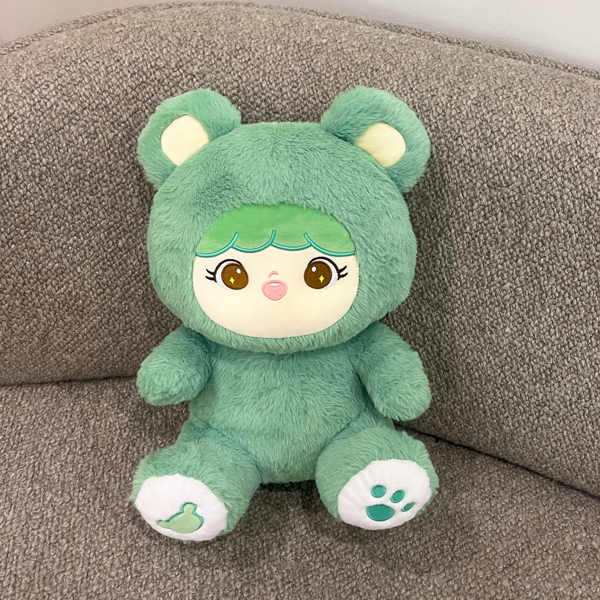 Shoobi in lifestyle setting sitting on couch