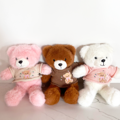 Brownie Carrington Teddy placed centrally beside Ballet Pink Carrington Teddy and Cream Carrington Teddy
